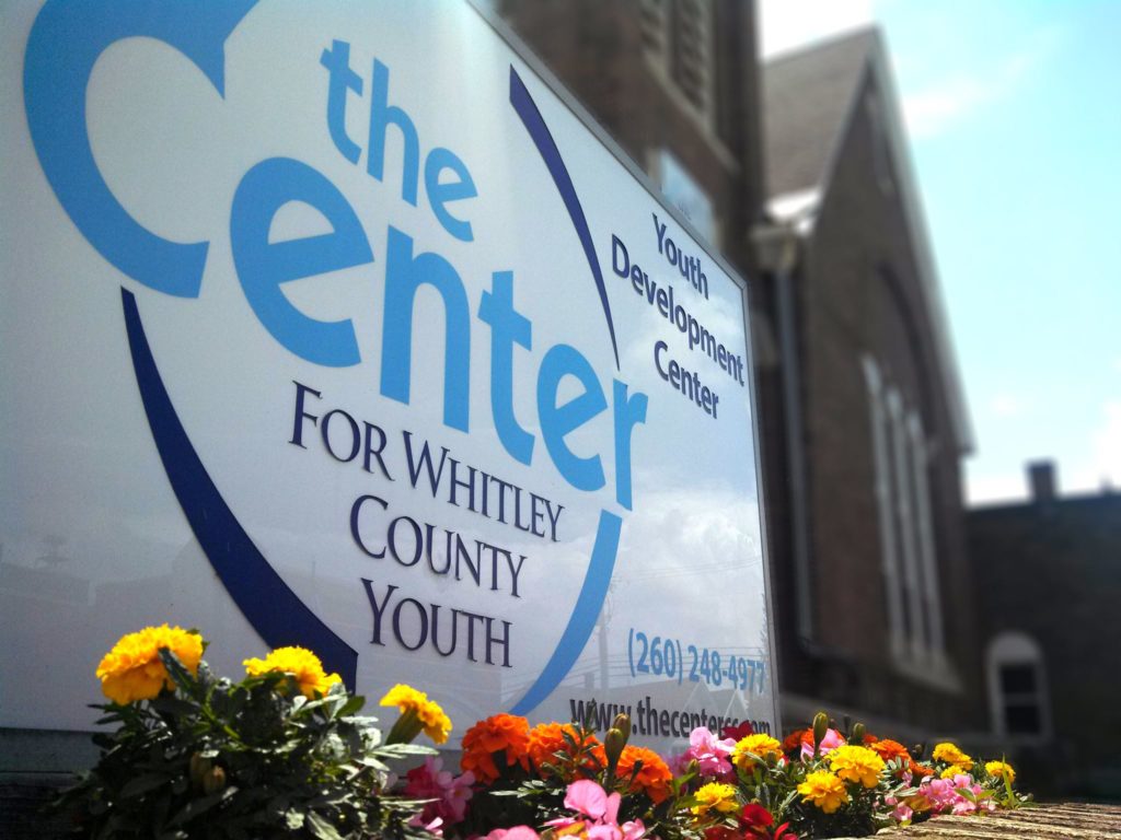 The Center for Whitley County Youth sign in front of the 201 West Market Street building