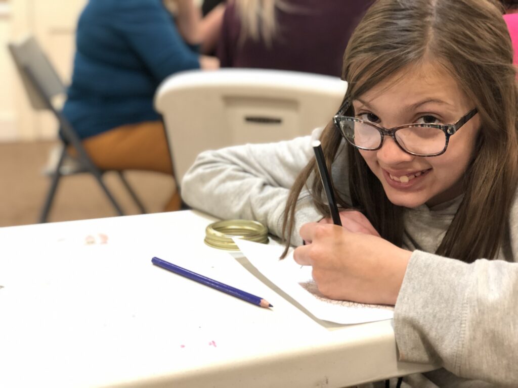 A student working on homework at a table