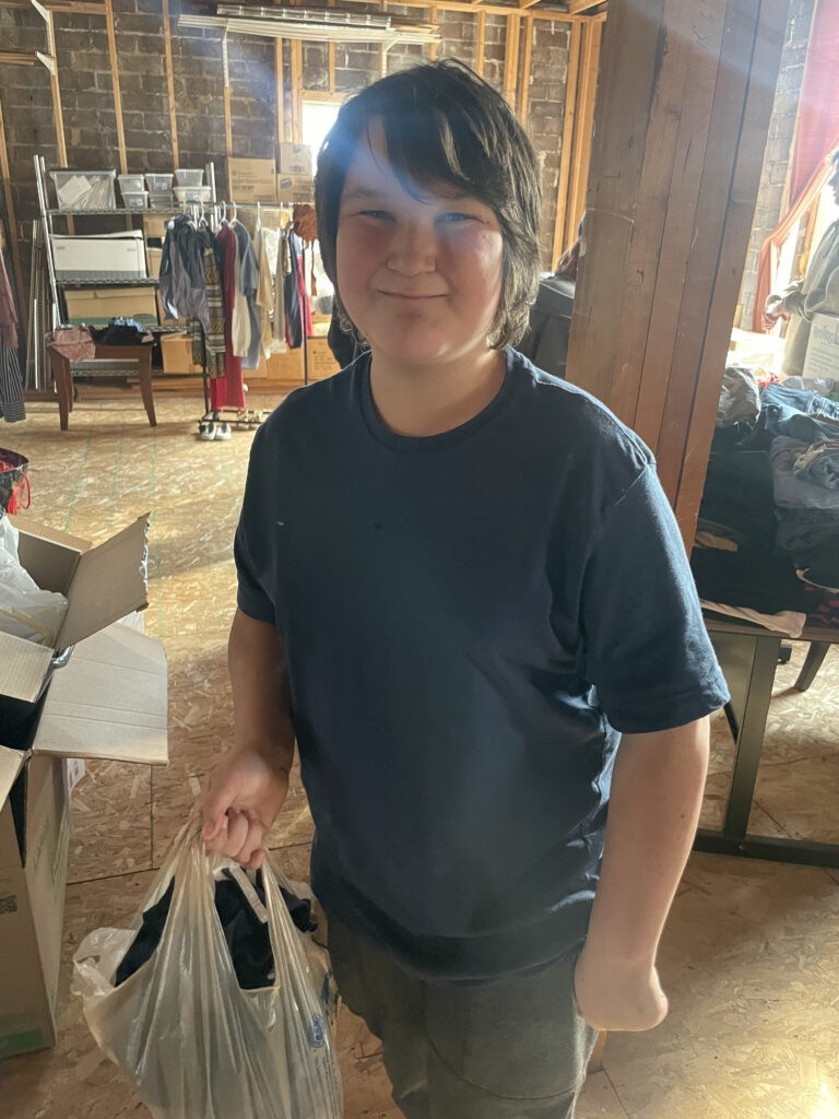 A smiling student indoors