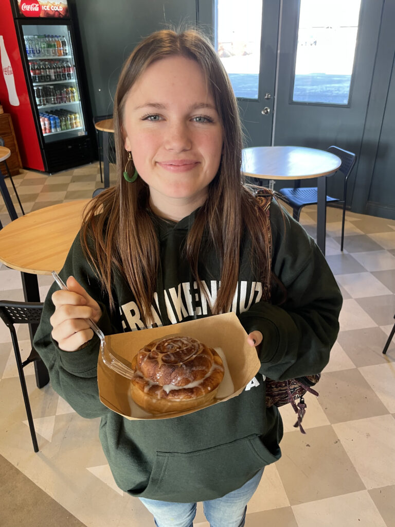 A student holding a plate of food